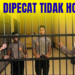DUA POLISI PENJILAT KUE HUT TNI DIPECAT TIDAK HORMAT